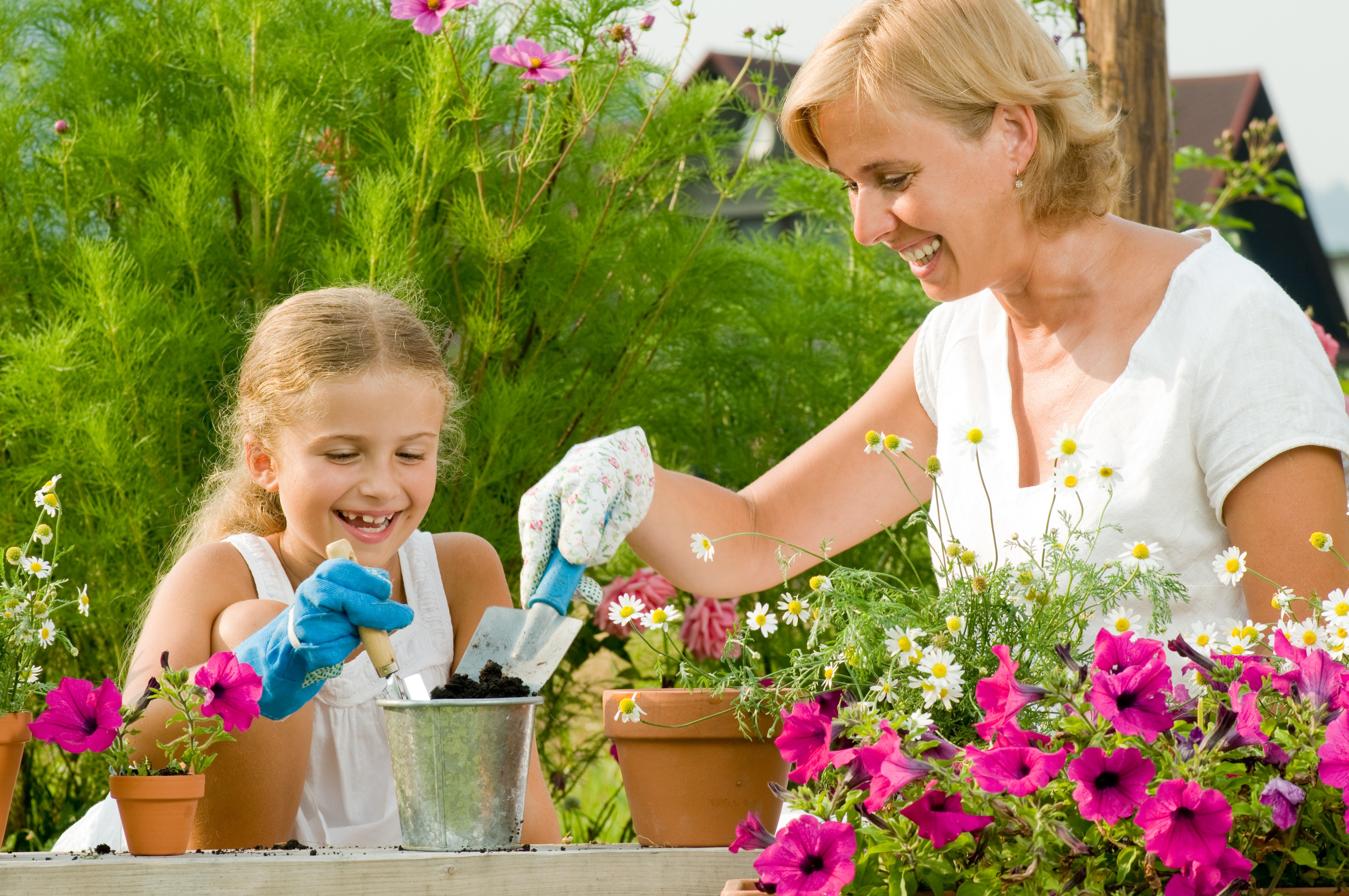 Mother and child gardening