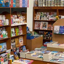 Image of books, jigsaws and toys available from the gift department.